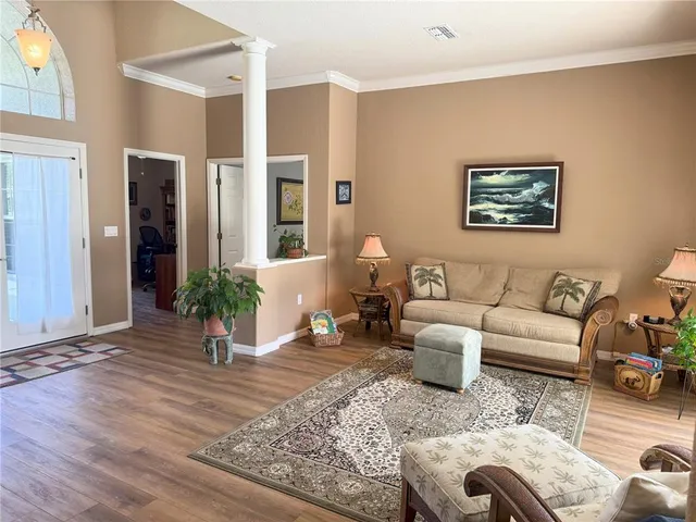 a kitchen with stainless steel appliances a stove a sink a microwave and a refrigerator