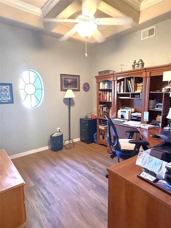 7552 River Country Drive Weeki Wachee, FL 34607 - Photo 28 of 59 a room with furniture and a book shelf