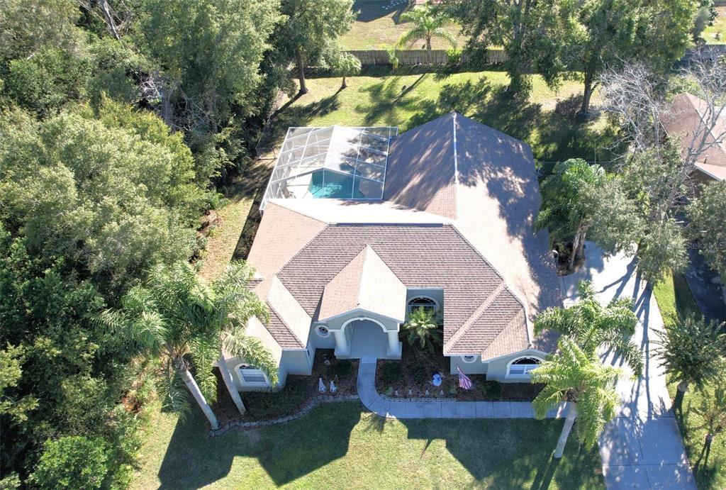 7552 River Country Drive Weeki Wachee, FL 34607 - Photo 6 of 59 an aerial view of a house with swimming pool and sitting area