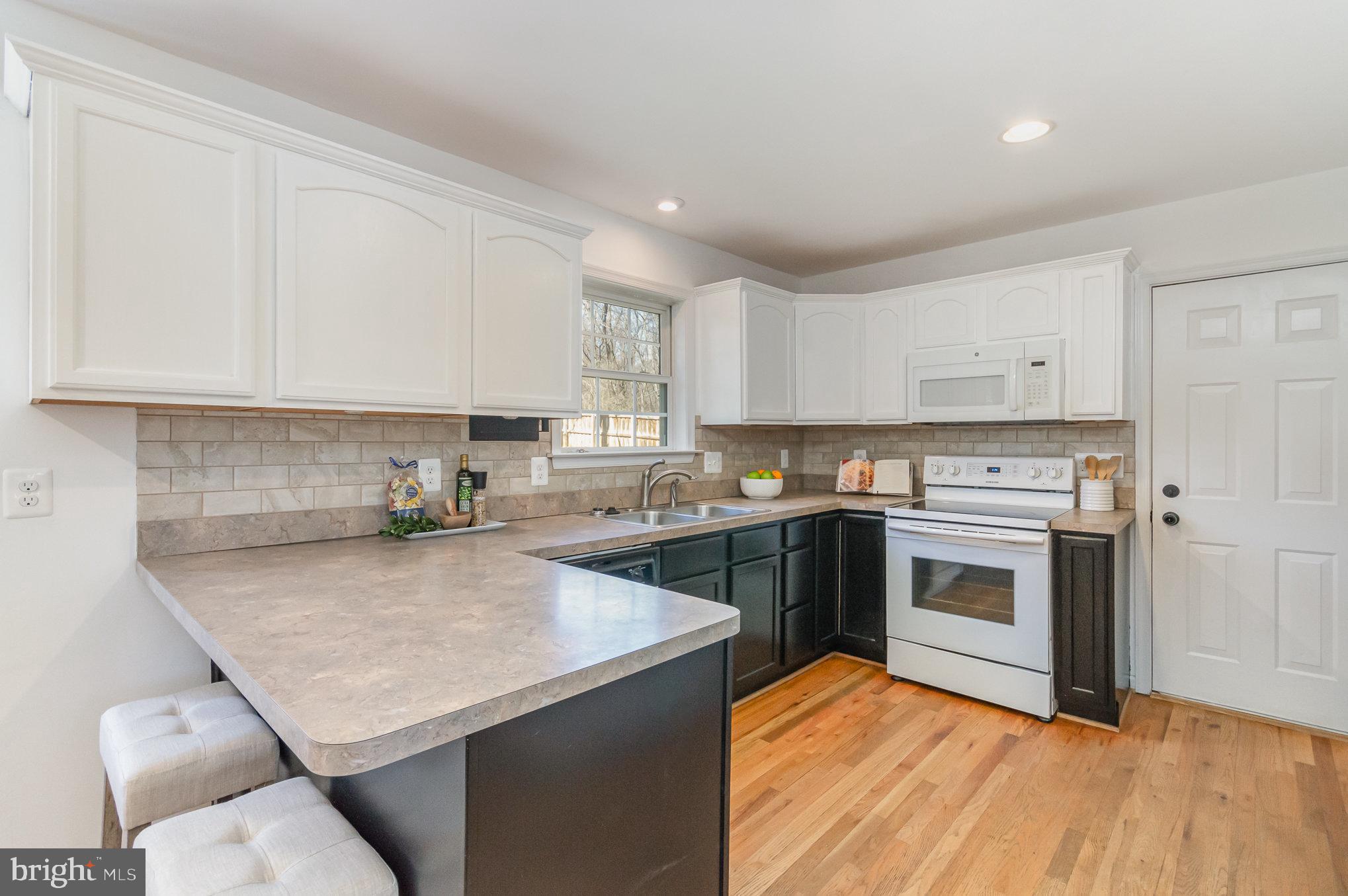 149 Rome Drive Clear Brook, VA 22624 - Photo 14 of 36 a kitchen with a sink appliances and cabinets