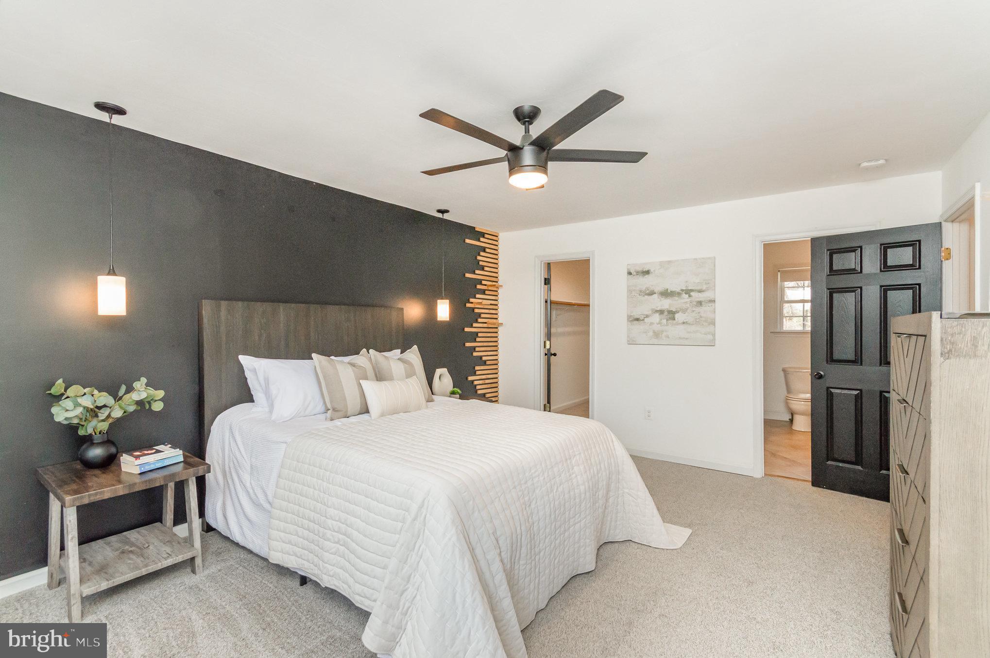 149 Rome Drive Clear Brook, VA 22624 - Photo 17 of 36 a bedroom with a bed chandelier and a window