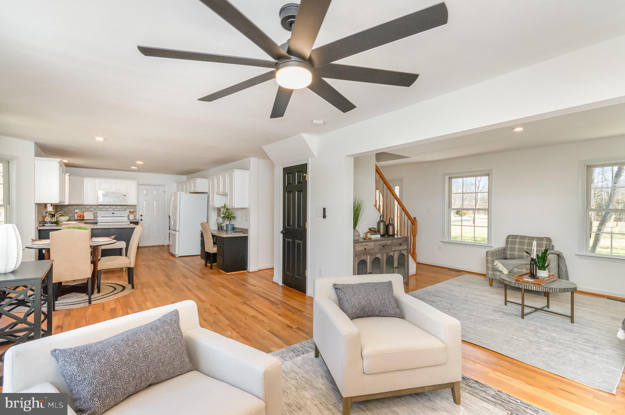 149 Rome Drive Clear Brook, VA 22624 - Photo 9 of 36 a living room with furniture kitchen view and a wooden floor