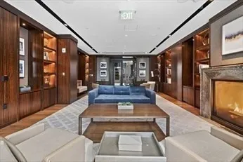 a view of a lobby with furniture and chandelier
