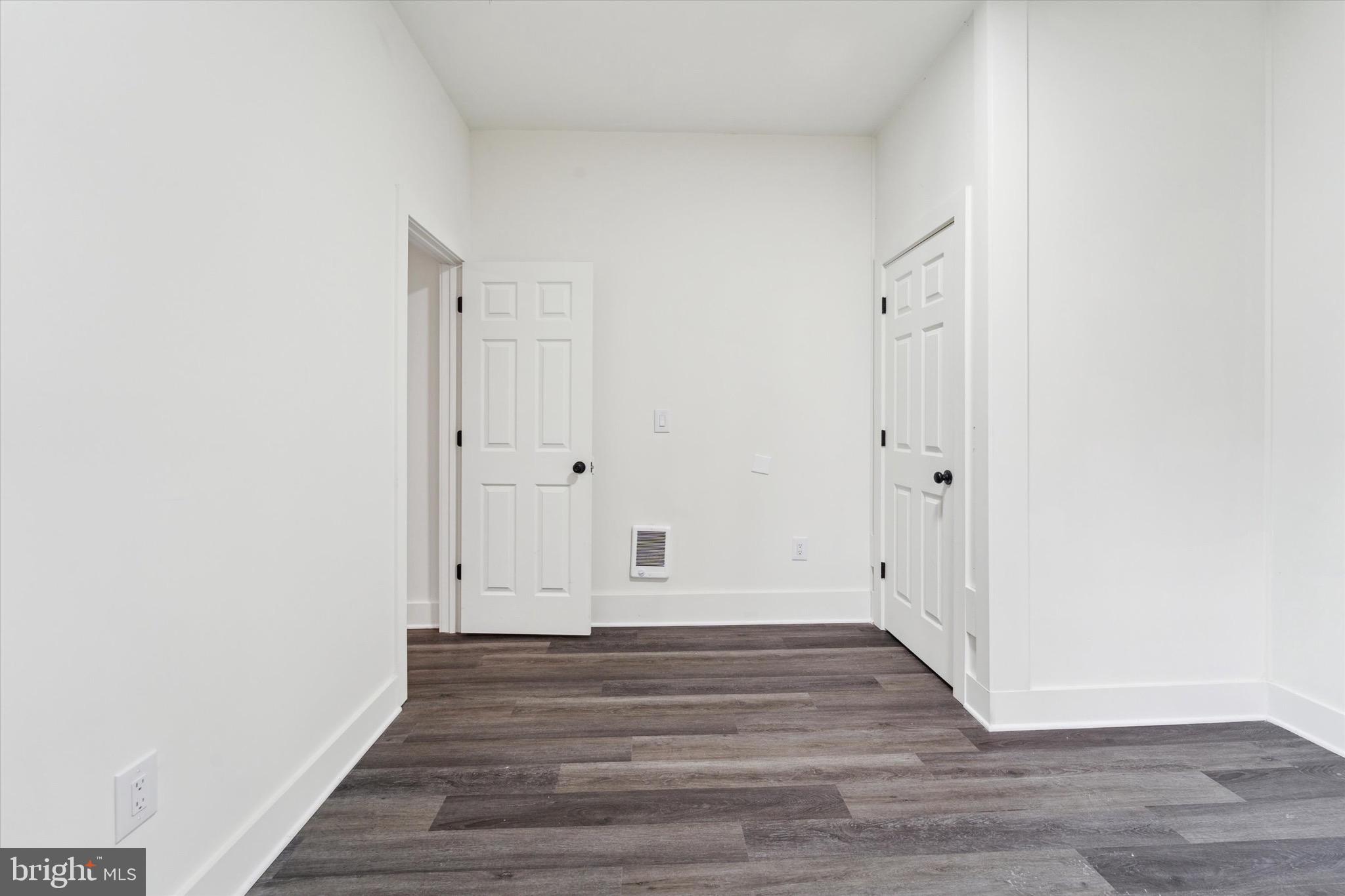 316 East 11th Street Chester, PA 19013 - Photo 14 of 28 a view of a room with wooden floor