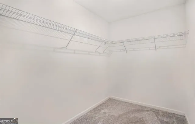 a view of a room with racks on the wall