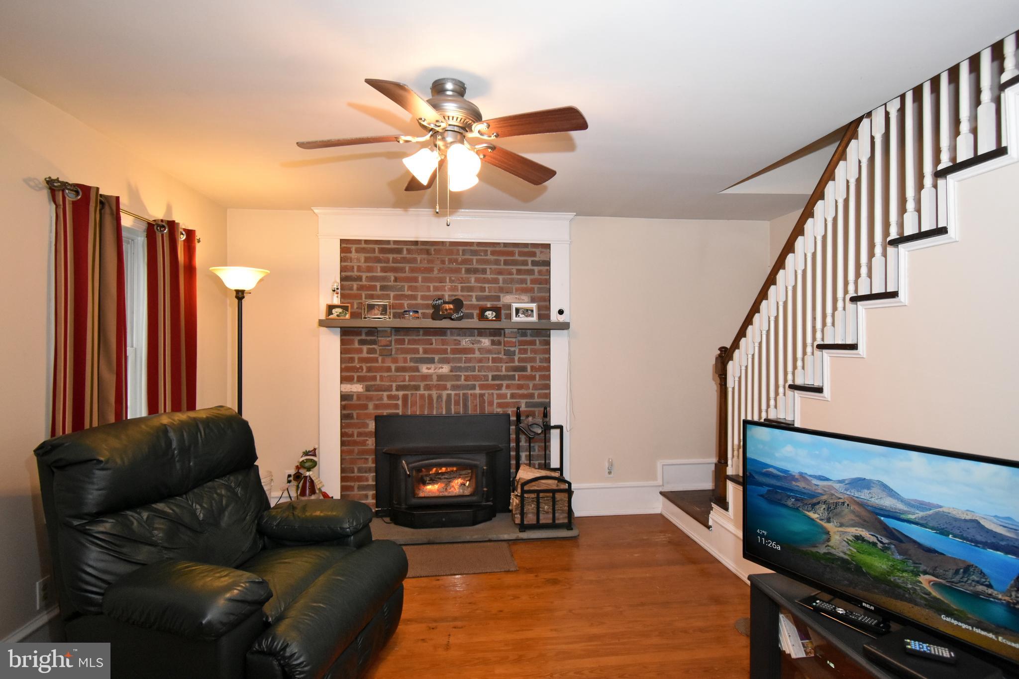 610 Eugenia Road Horsham, PA 19044 - Photo 4 of 23 Warm and cozy living room w/fireplace