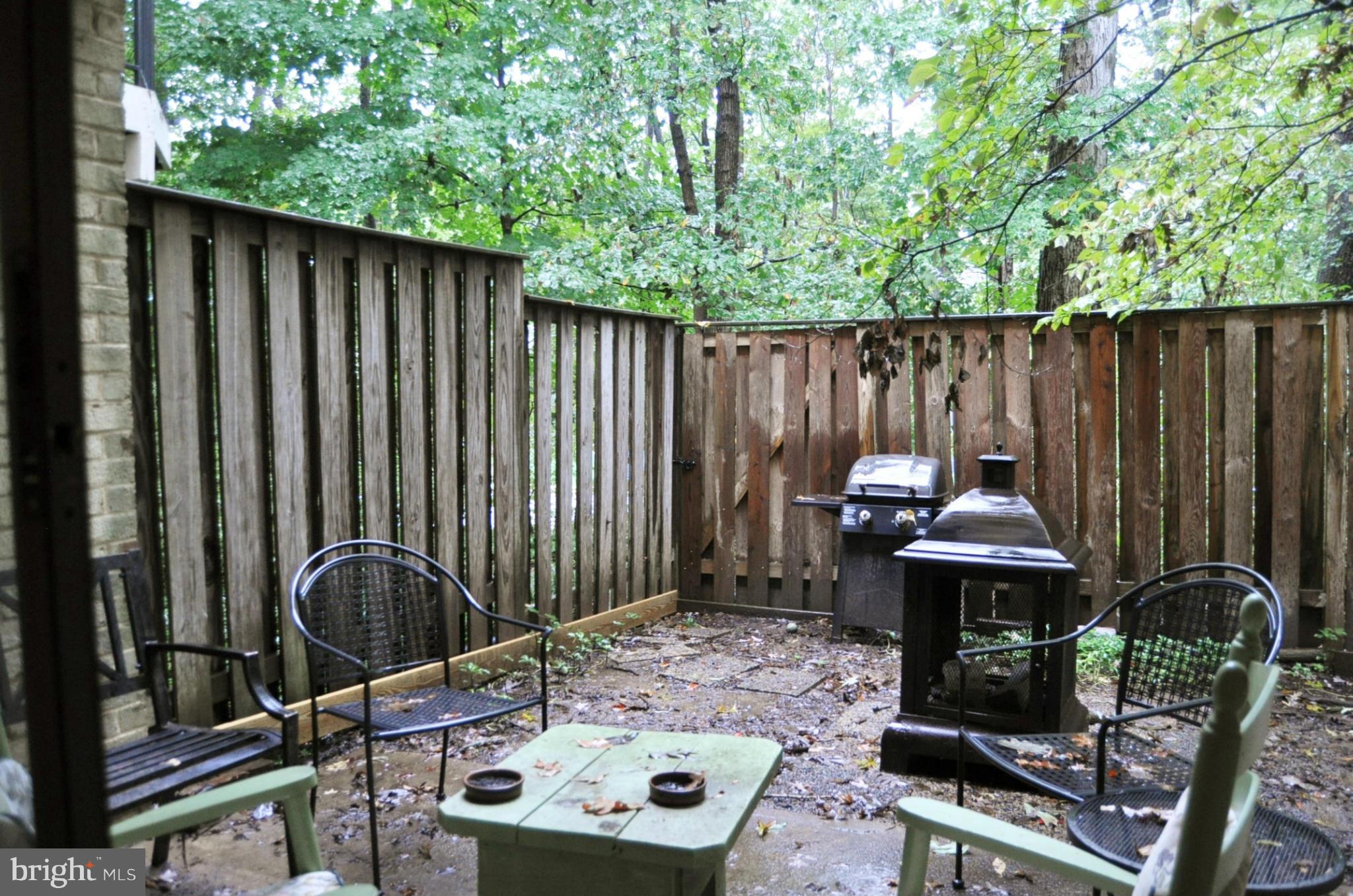 11057 Saffold Way Reston, VA 20190 - Photo 28 of 30 Fenced Backyard Backs to Trees
