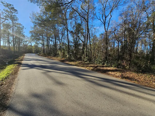 a view of a road with a building