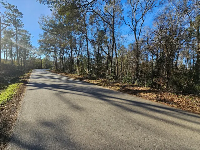 a view of a road with a building