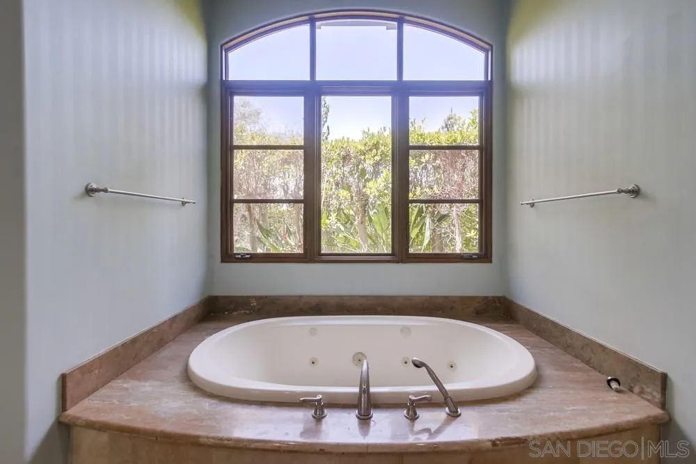 14175 Biscayne Place Poway, CA 92064 - Photo 21 of 65 a bath tub sitting in a bathroom next to a window