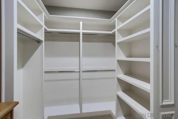 a view of an empty walk in closet