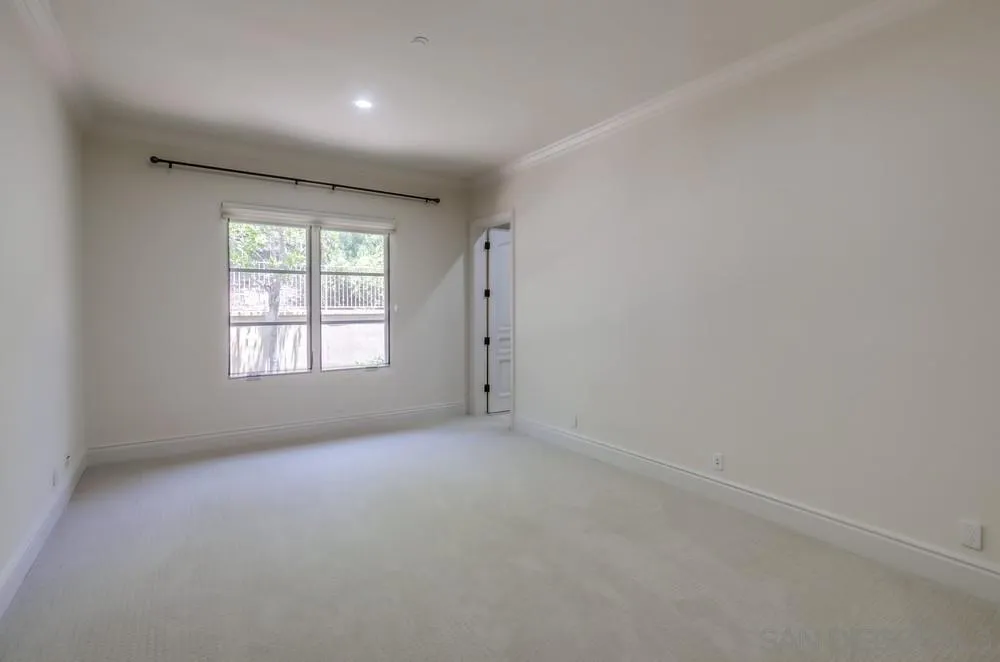 14175 Biscayne Place Poway, CA 92064 - Photo 33 of 65 an empty room with windows