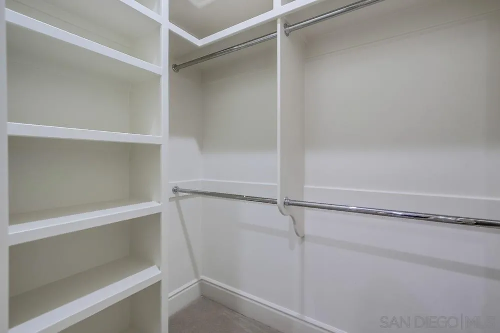 14175 Biscayne Place Poway, CA 92064 - Photo 37 of 65 a view of an empty walk in closet