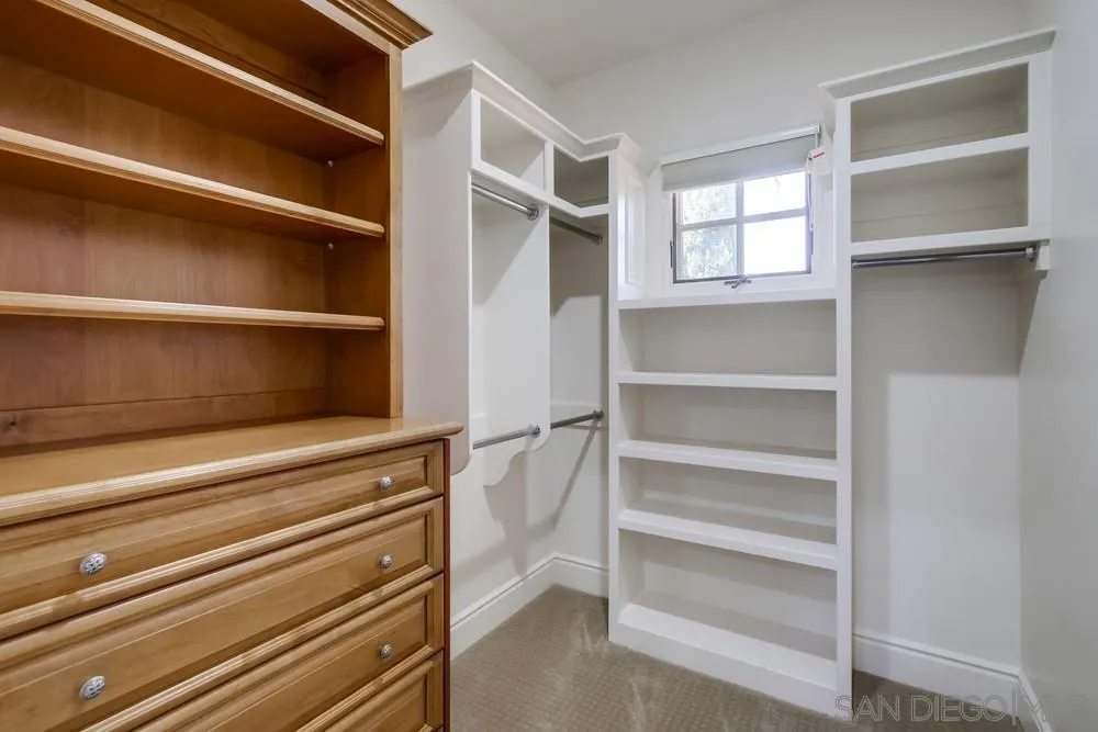 14175 Biscayne Place Poway, CA 92064 - Photo 49 of 65 a view of walk in closet with empty racks