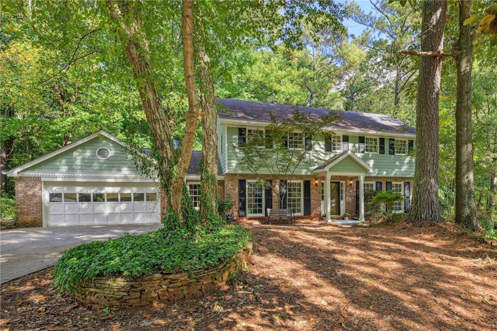 3873 Rains Court Northeast Brookhaven, GA 30319 - Photo 1 of 1 front view of a house with a yard