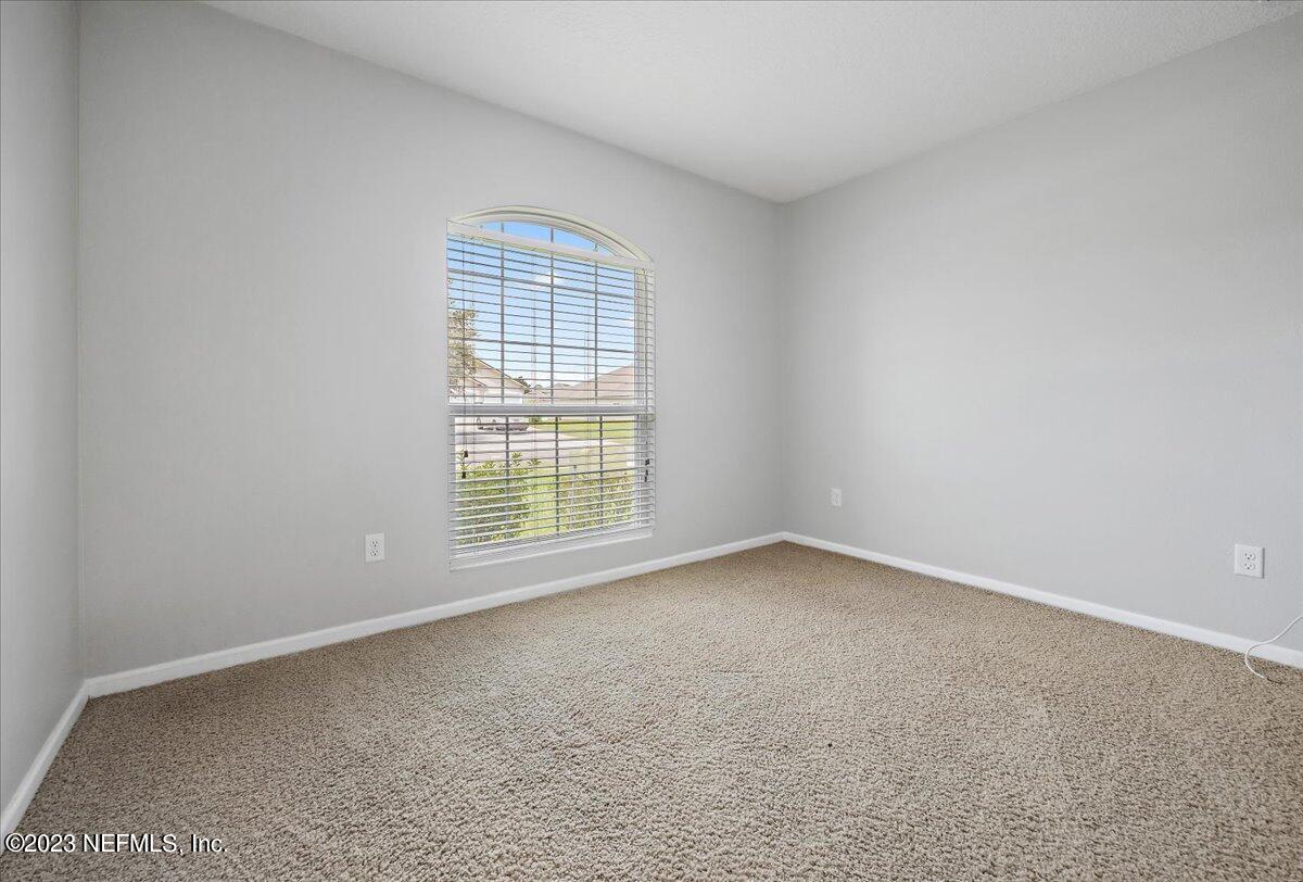 4046 Trail Ridge Road Middleburg, FL 32068 - Photo 13 of 22 an empty room with a window