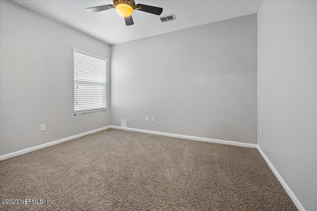 4046 Trail Ridge Road Middleburg, FL 32068 - Photo 16 of 22 an empty room with a window