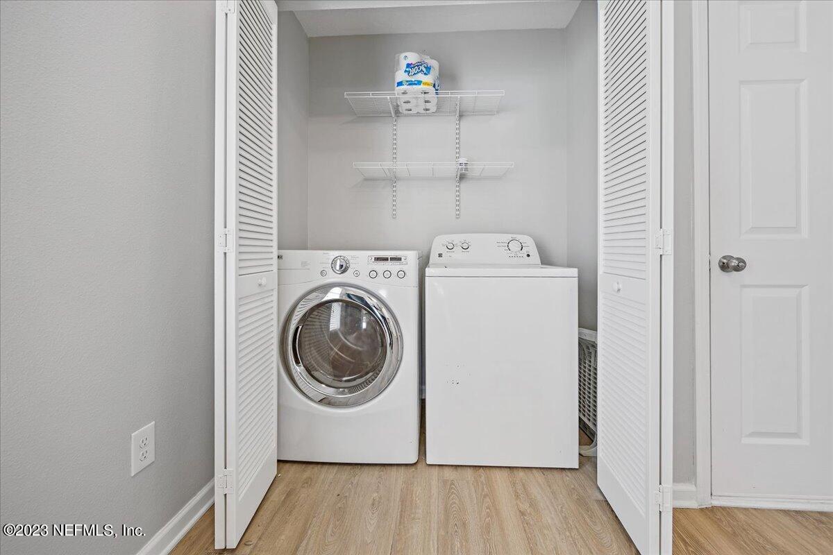 4046 Trail Ridge Road Middleburg, FL 32068 - Photo 17 of 22 a utility room with dryer and washer