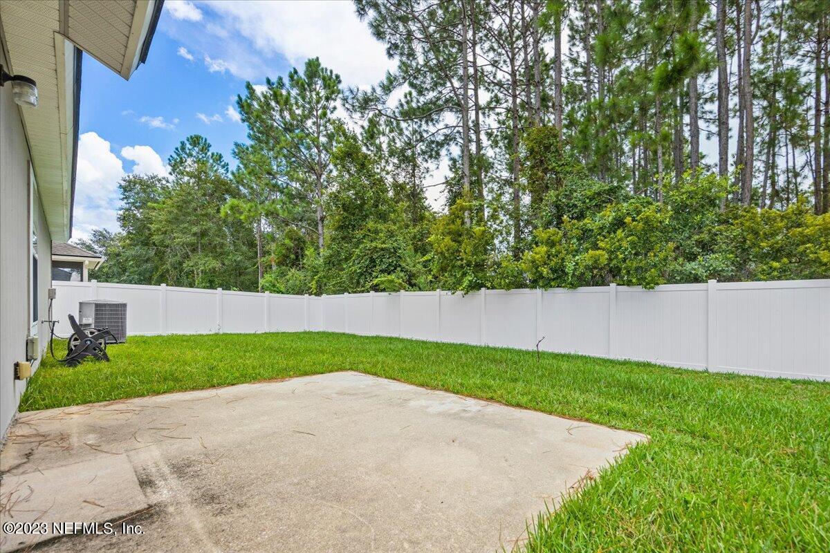 4046 Trail Ridge Road Middleburg, FL 32068 - Photo 18 of 22 a view of an outdoor space and a yard