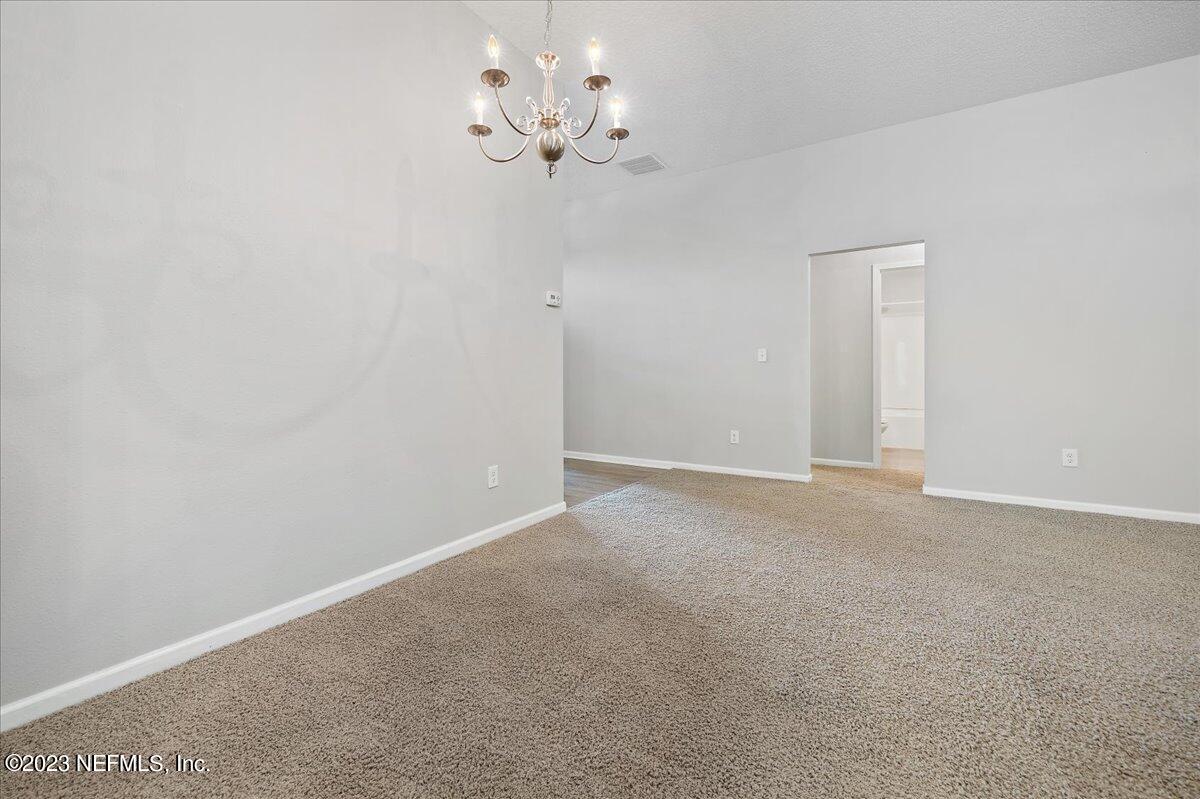 4046 Trail Ridge Road Middleburg, FL 32068 - Photo 6 of 22 a view of a chandelier in big room