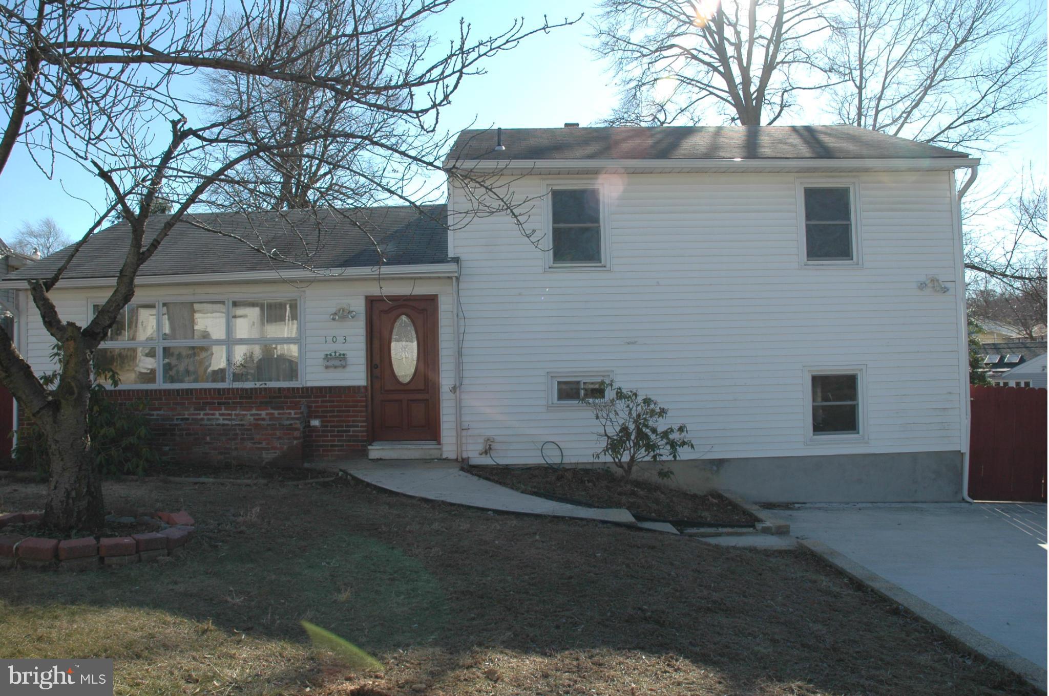 103 Mountain Road Linthicum, MD 21090 - Photo 16 of 17 a view of a house with a yard