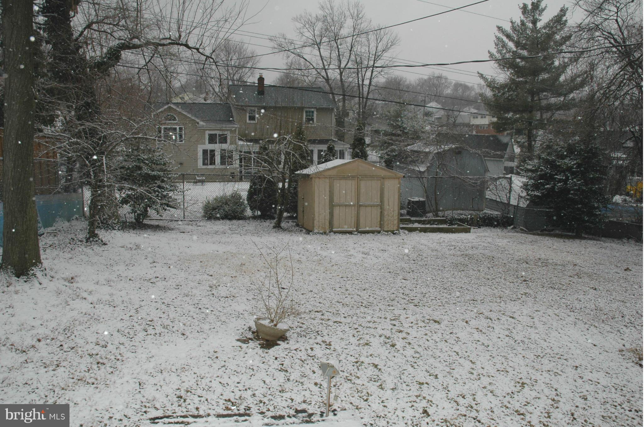 103 Mountain Road Linthicum, MD 21090 - Photo 17 of 17 a view of a yard with large trees