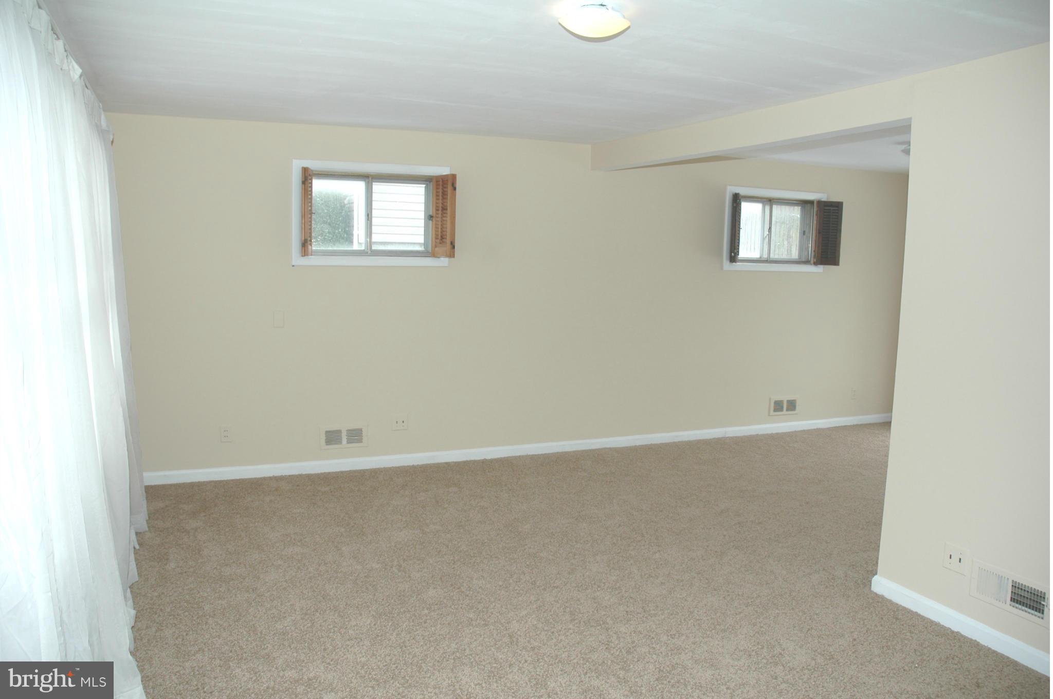 103 Mountain Road Linthicum, MD 21090 - Photo 3 of 17 an empty room with a window