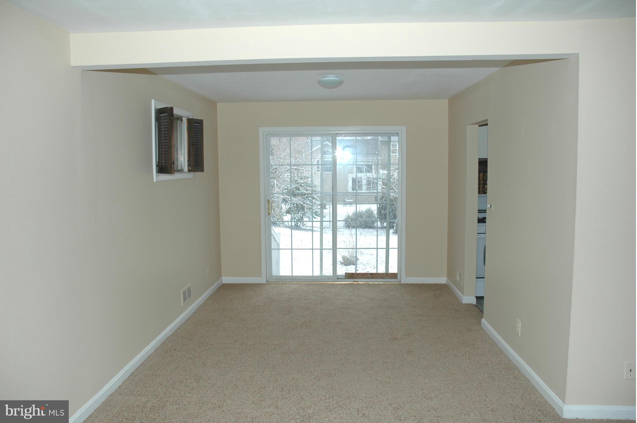 103 Mountain Road Linthicum, MD 21090 - Photo 5 of 17 a view of an empty room with a window