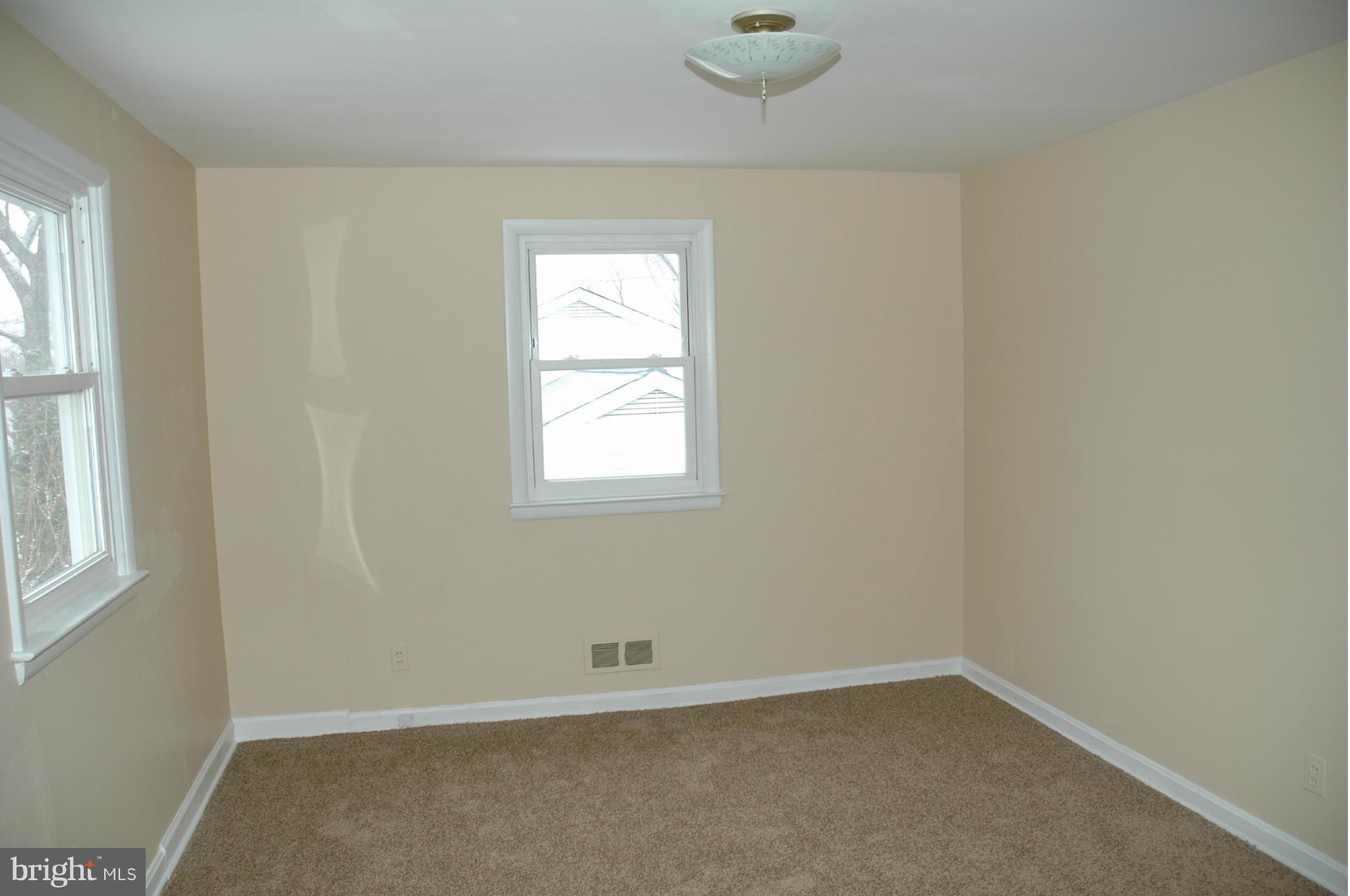 103 Mountain Road Linthicum, MD 21090 - Photo 9 of 17 an empty room with windows