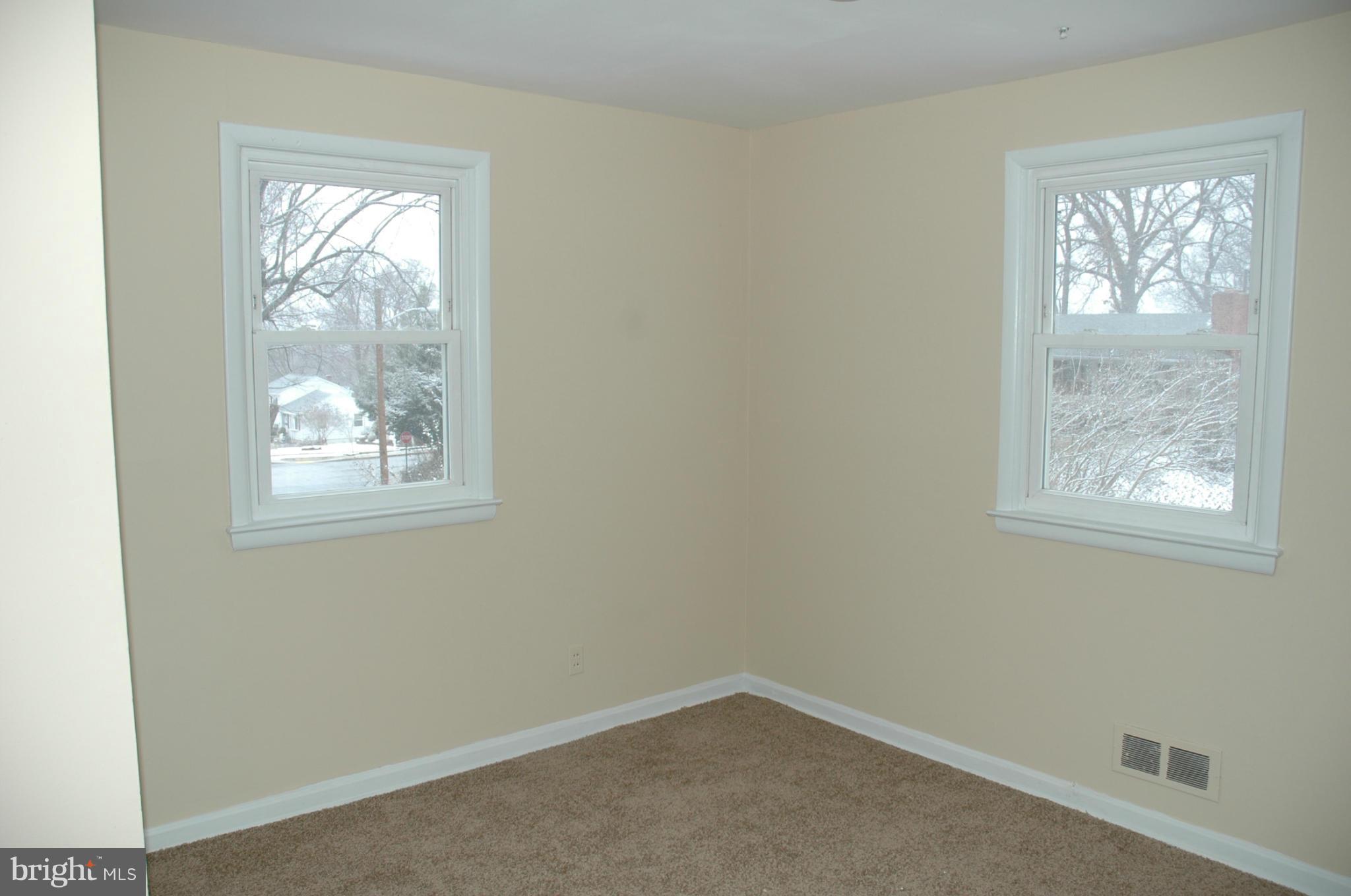 103 Mountain Road Linthicum, MD 21090 - Photo 10 of 17 an empty room with windows
