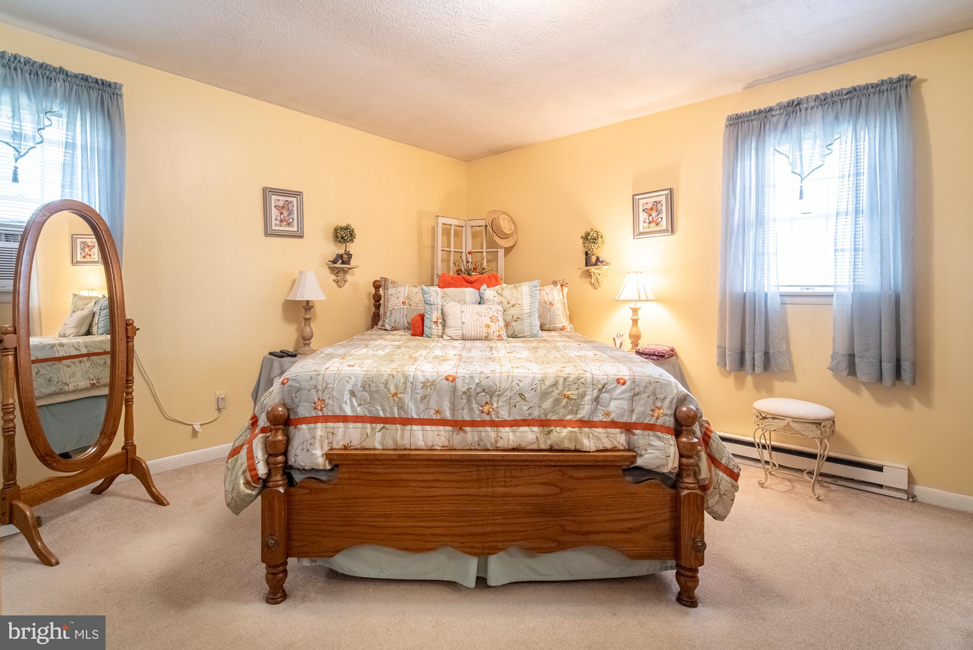 1398 Manor Road Windsor, PA 17366 - Photo 15 of 39 Charming bedroom with soft pastel hues.