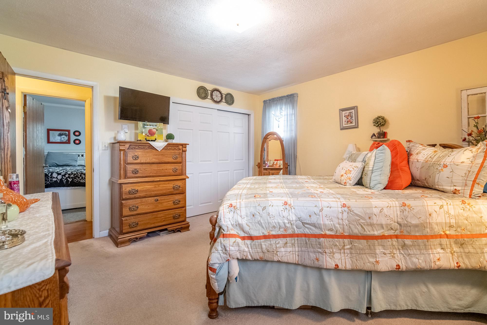 1398 Manor Road Windsor, PA 17366 - Photo 16 of 39 Cozy bedroom with warm, inviting tones.