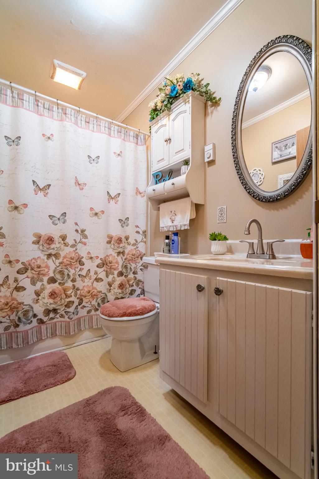 1398 Manor Road Windsor, PA 17366 - Photo 20 of 39 Charming bathroom with floral accents.