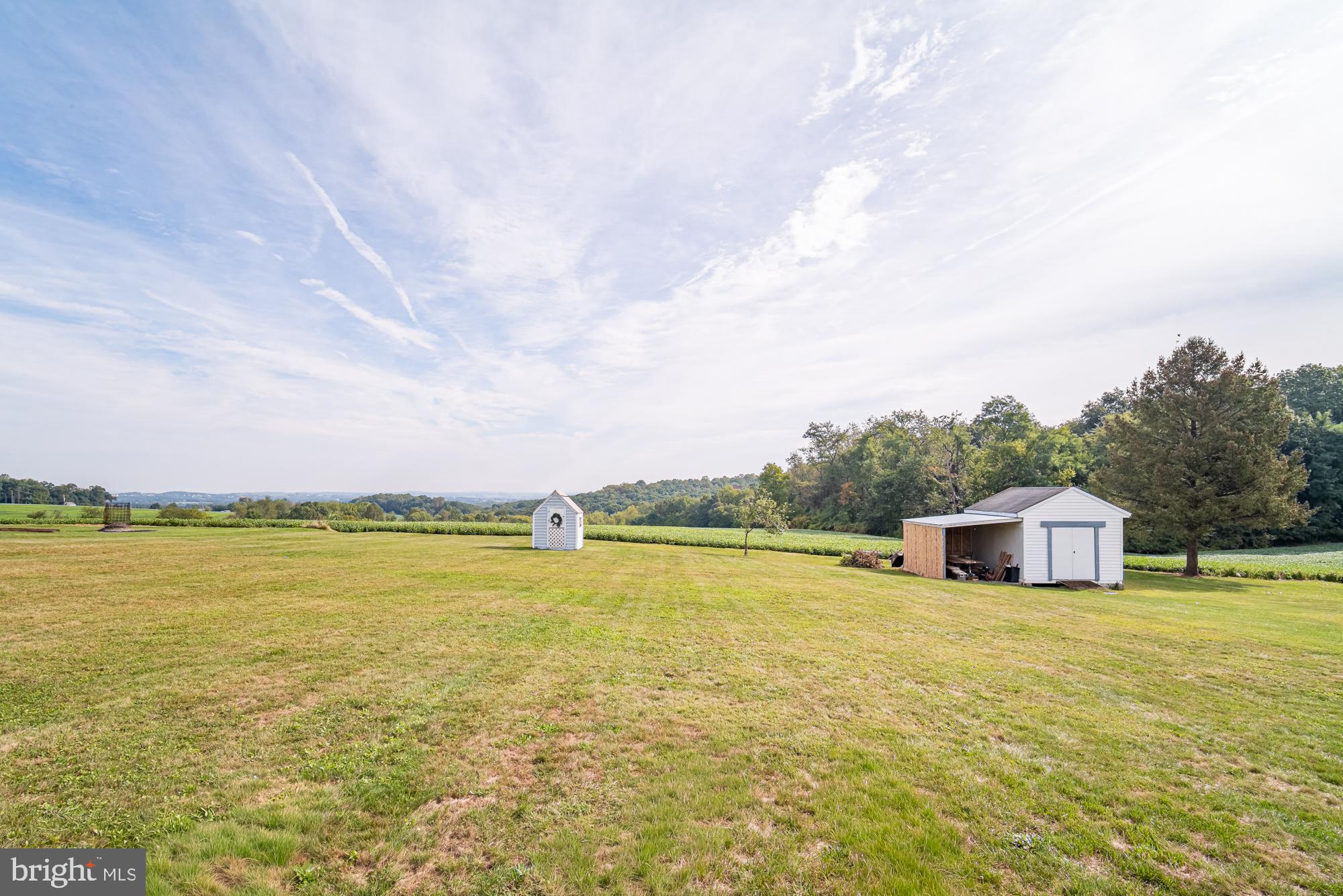 1398 Manor Road Windsor, PA 17366 - Photo 2 of 39 Expansive green fields under a serene sky.