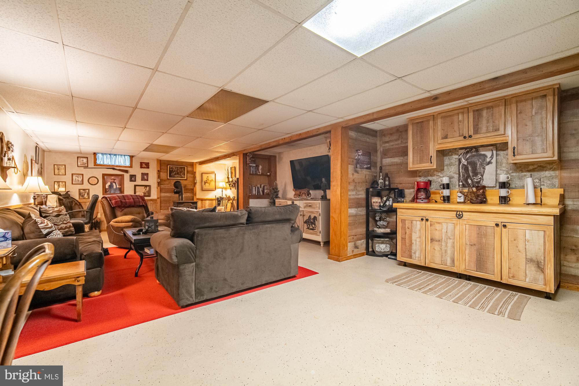 1398 Manor Road Windsor, PA 17366 - Photo 21 of 39 Cozy basement retreat with rustic charm.
