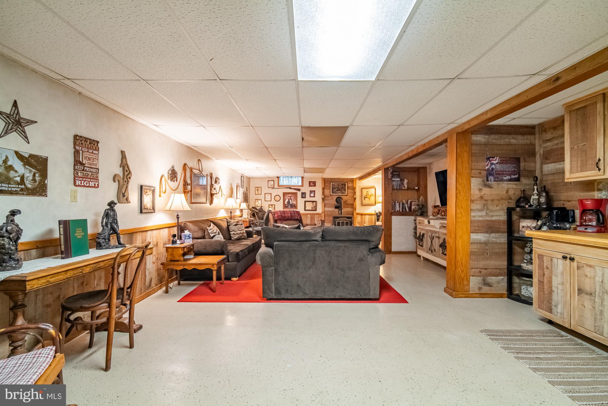 1398 Manor Road Windsor, PA 17366 - Photo 22 of 39 Cozy basement retreat with rustic charm.