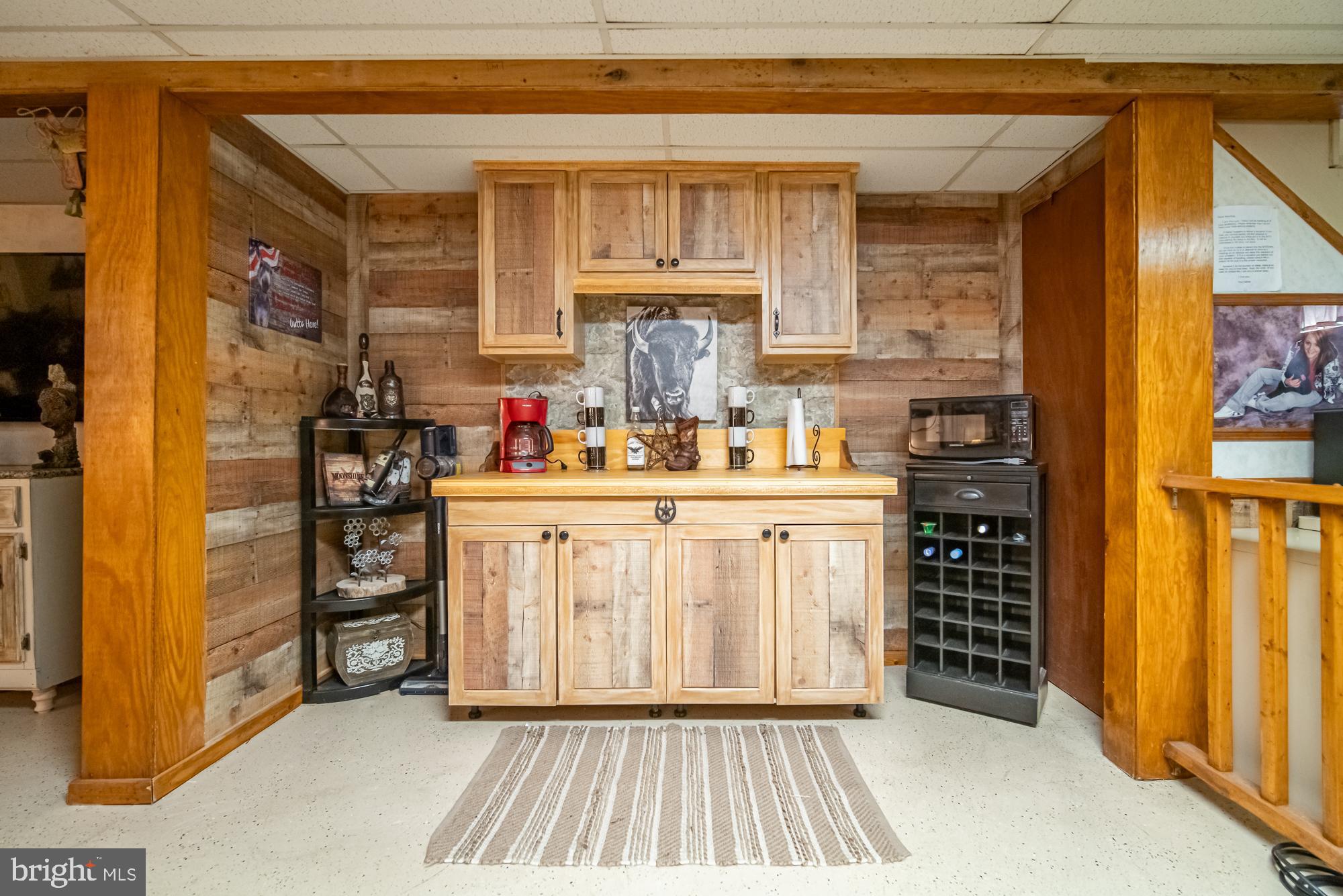1398 Manor Road Windsor, PA 17366 - Photo 23 of 39 Cozy rustic bar area with wooden accents.