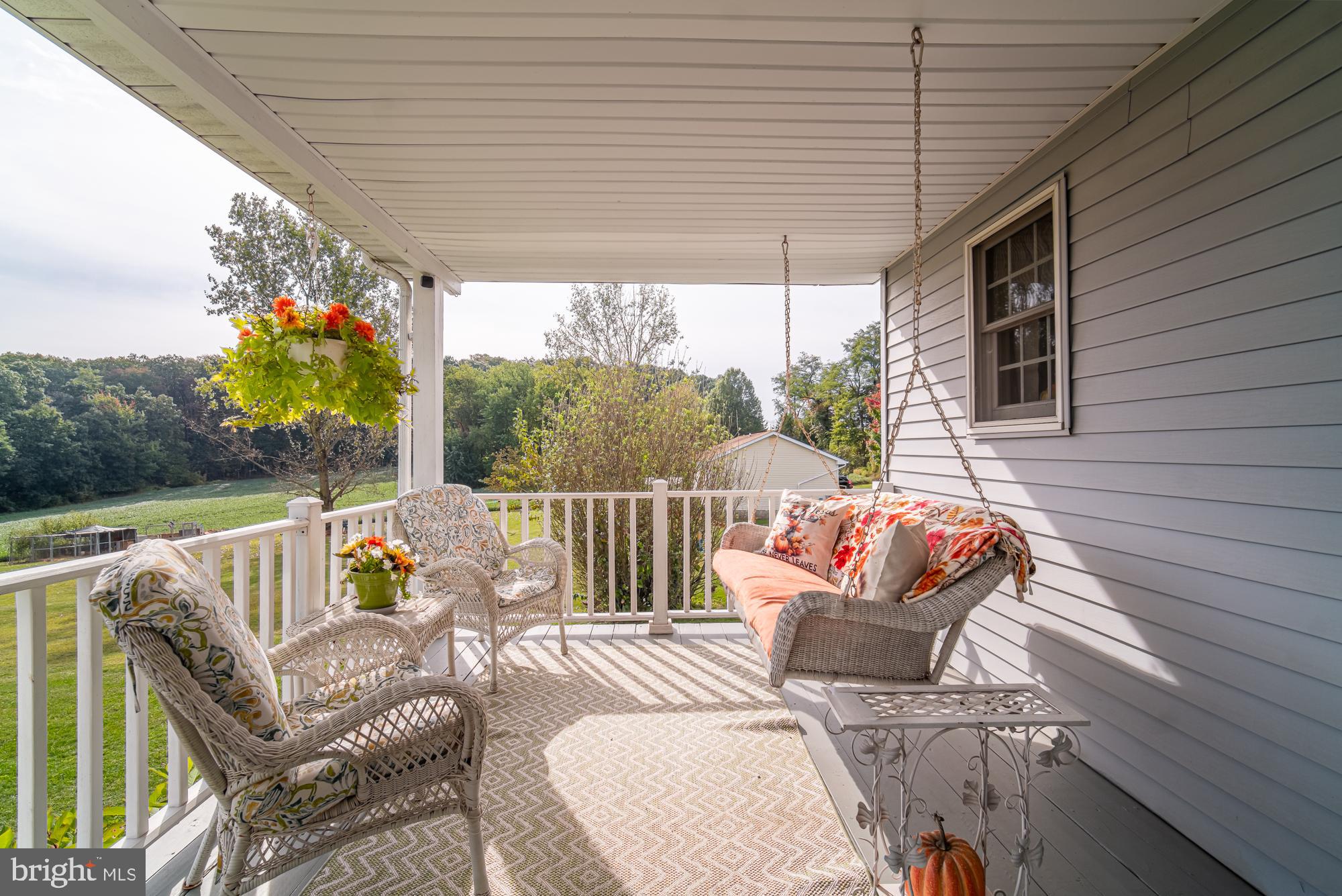 1398 Manor Road Windsor, PA 17366 - Photo 28 of 39 Charming porch with scenic countryside views.