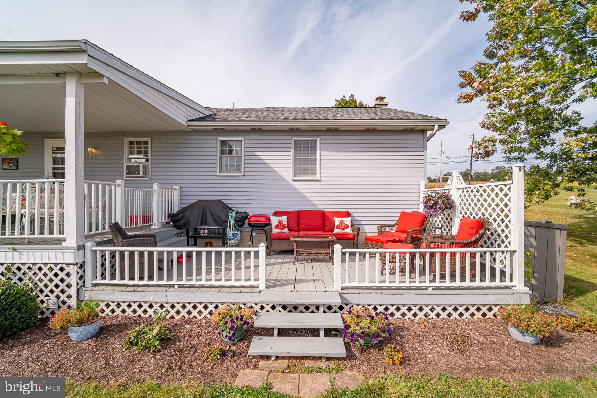 1398 Manor Road Windsor, PA 17366 - Photo 29 of 39 Charming deck with vibrant outdoor seating.