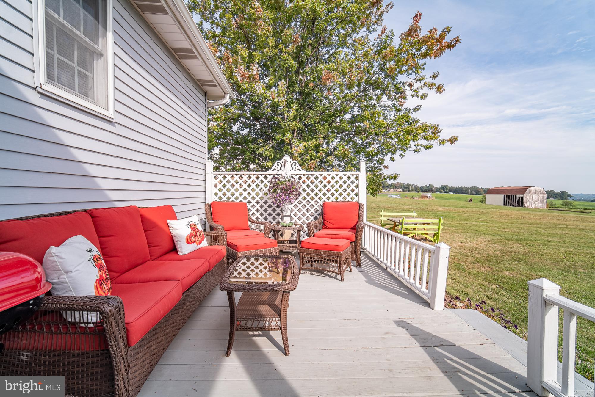 1398 Manor Road Windsor, PA 17366 - Photo 30 of 39 Charming porch with scenic countryside views.