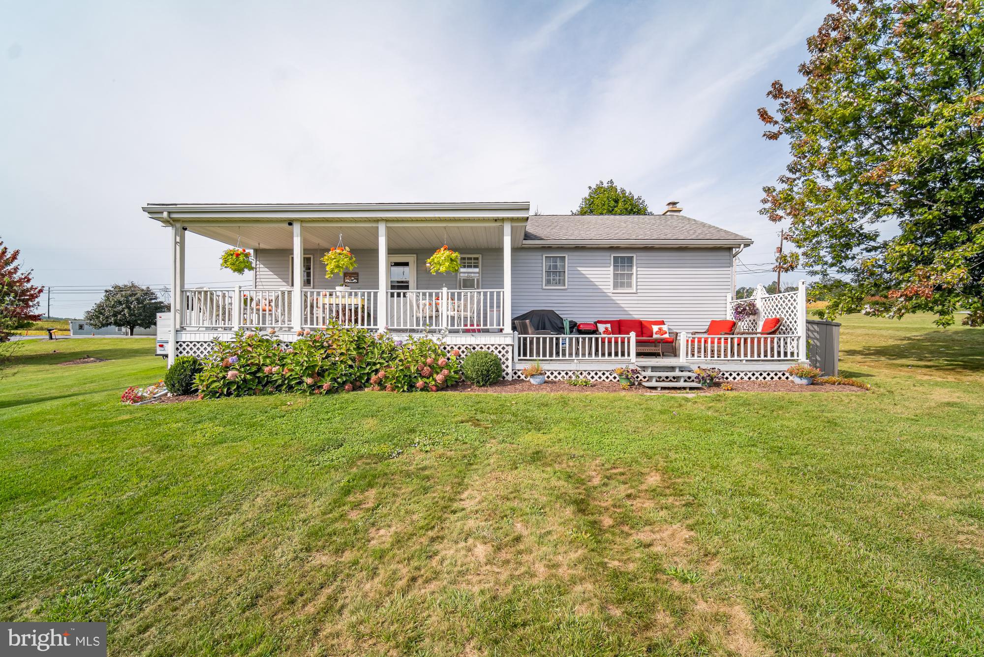 1398 Manor Road Windsor, PA 17366 - Photo 3 of 39 Charming home with inviting porch and lush lawn.