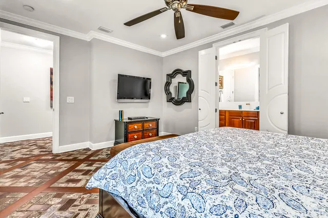 a living room with a couch next to a window with outer view