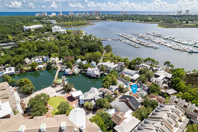 an aerial view of a city with lake view