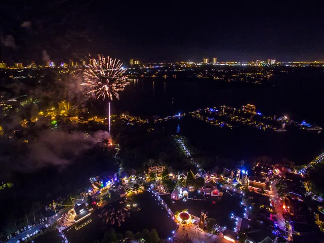 a view of a swimming pool with a yard