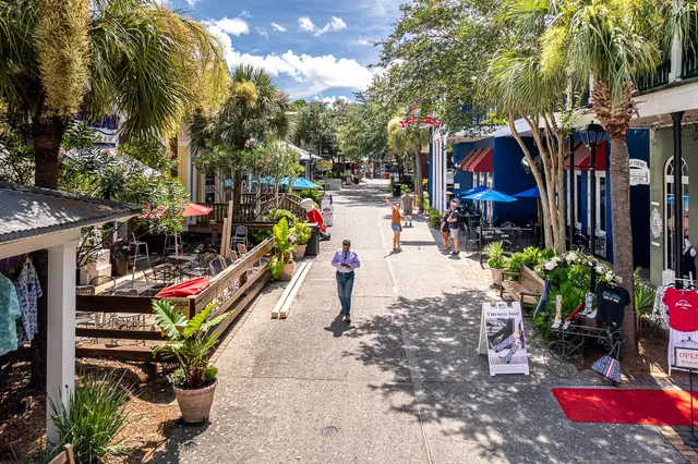 a city street lined with tall buildings