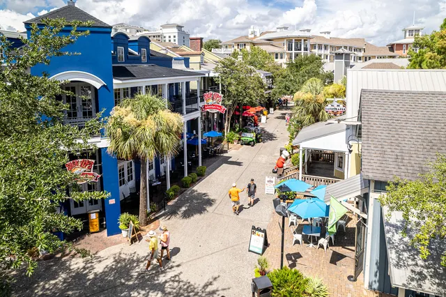 a view of street with stores