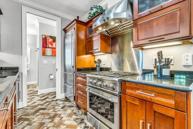 a dining room dining table chairs and a view of living room