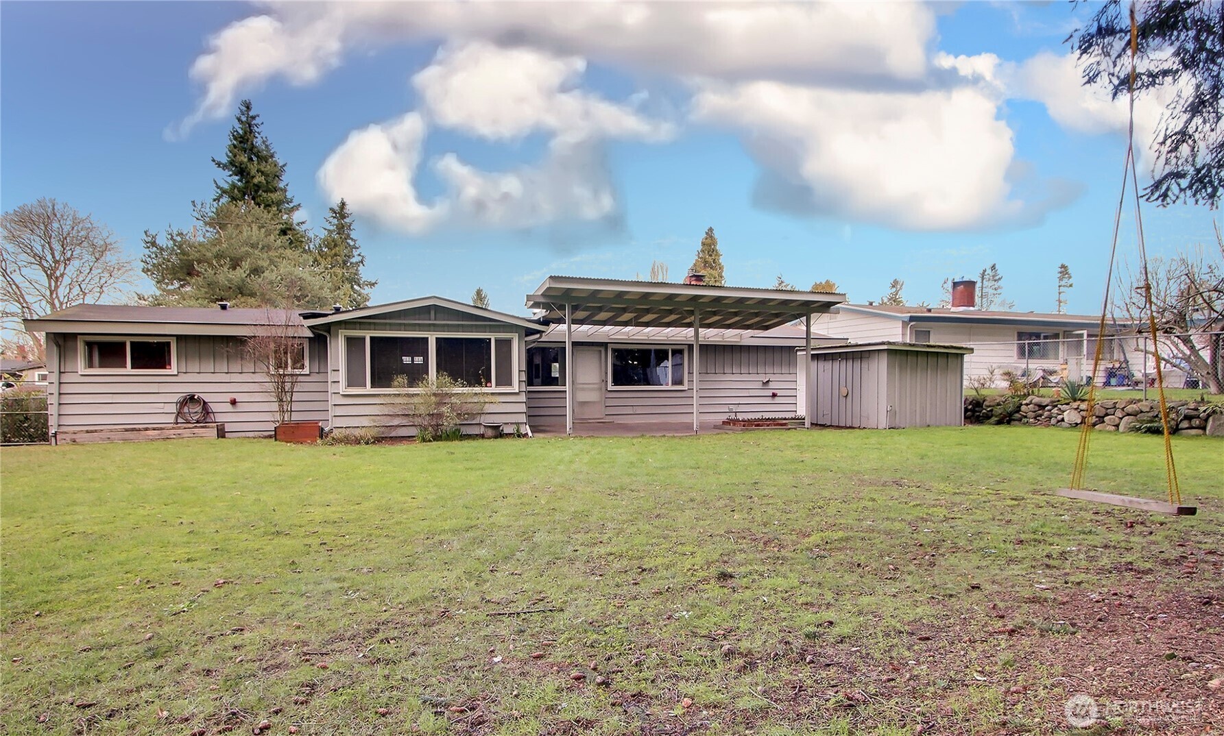 1415 South 303rd Street Federal Way, WA 98003 - Photo 15 of 15 a front view of a house with garden