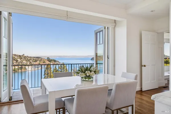 a spacious bedroom with a bed and a fireplace