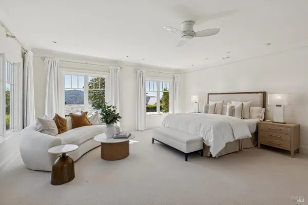 a view of a balcony with lake view and wooden floor